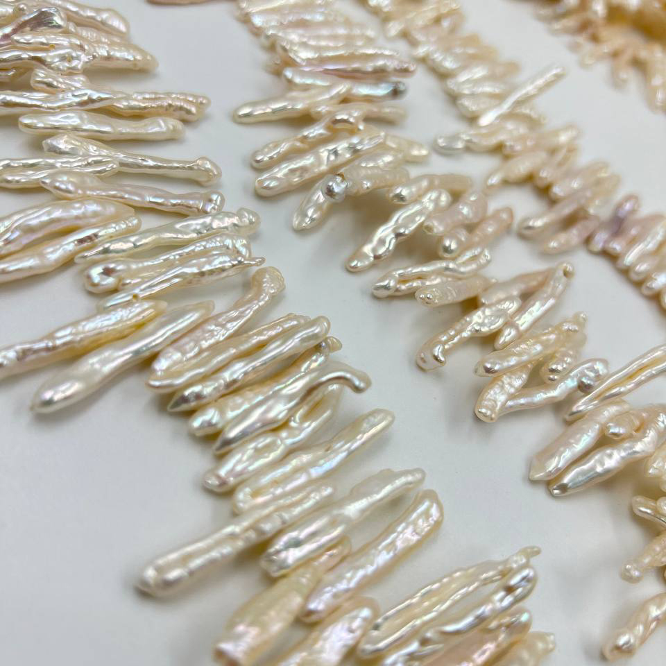 Жемчуг речной натуральный формы бива АА размер 27*4мм